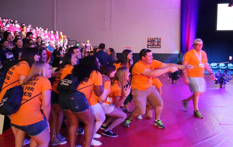 A group of students use a selfie stick to take a large, group selfie Friday during Eagle Convocation at the Physical Activities Center. Photo by Hannah Spurgeon/The Shield