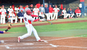 Kyle Kempf hits a ball during the 2013 spring season. File Photo/Jimmy Pyles