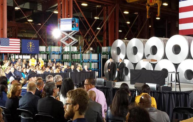 An audience waits for President Obama's arrival at Millenium Steel.