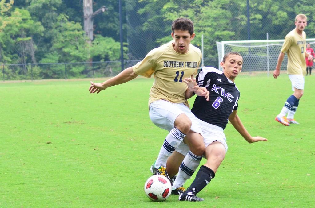 Eagles player Colton Tanner keeps the ball away from a KWC player during last week's 'Gold Game.'