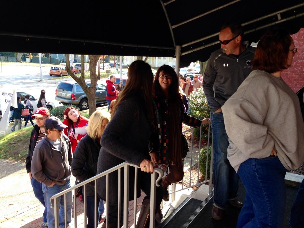 A crowd of people enters Kirby's Fine Dining Saturday morning to purchase handmade ceramic bowls, benefitting those in need. 