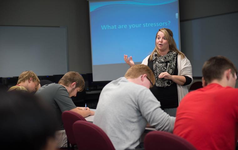 Student Support Services Program Director Heather Bauer teaches university student about stressors during a UNIV 101 course. Photography courtesy of Photo Services